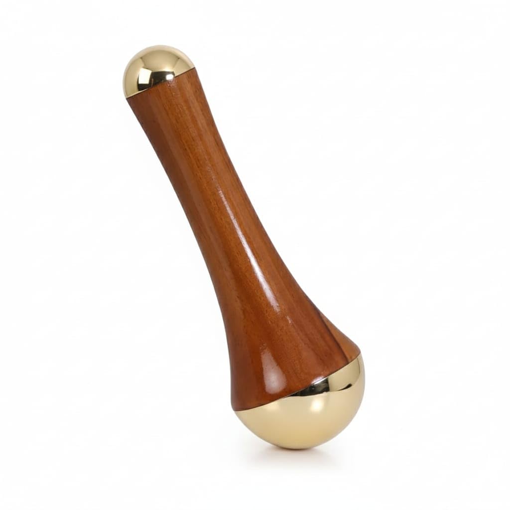 Ayurvedic Kansa wand, a holistic wellness tool designed to help balance the body's pH levels
