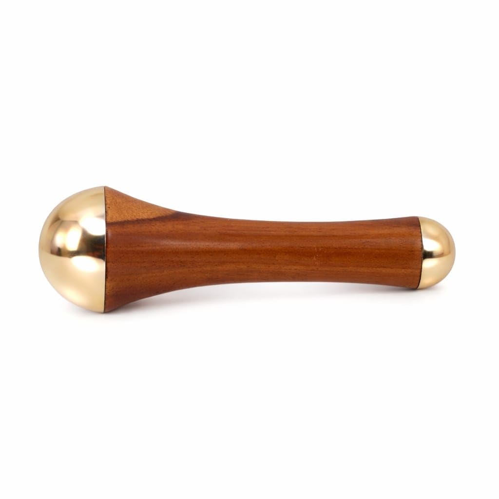 Ayurvedic Kansa wand, a holistic wellness tool designed to help balance the body's pH levels